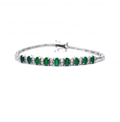White gold bracelet with diamonds 0.34 ct and emeralds 1.95 ct