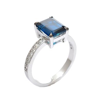 White gold ring with diamonds 0.25 ct and blue topaz 2.55 ct