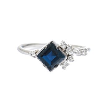 White gold ring with diamonds 0.15 ct and blue topaz 0.72 ct