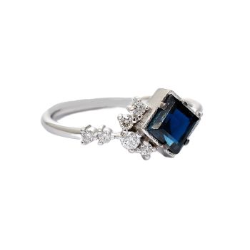 White gold ring with diamonds 0.15 ct and blue topaz 0.72 ct
