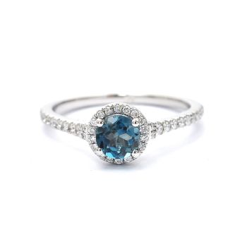 White gold ring with diamonds 0.25 ct and blue topaz 0.63 ct